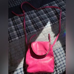 Pink crossbody bag.